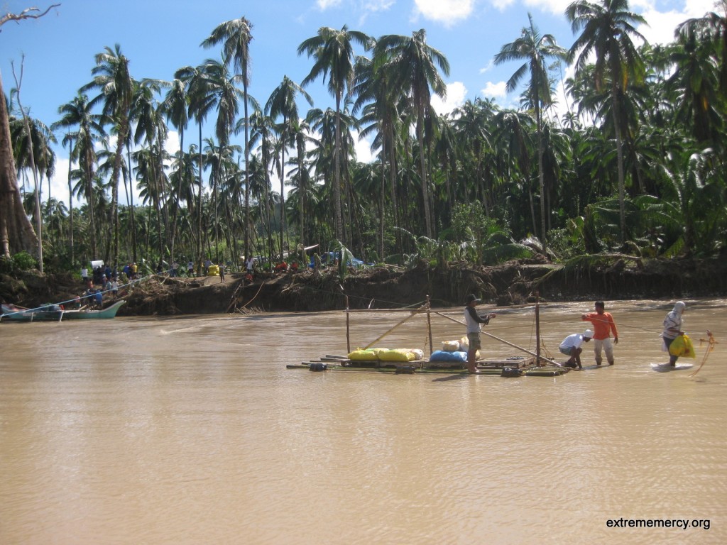 We had to cross the river with this bamboo raft because the bridge was washed out.
