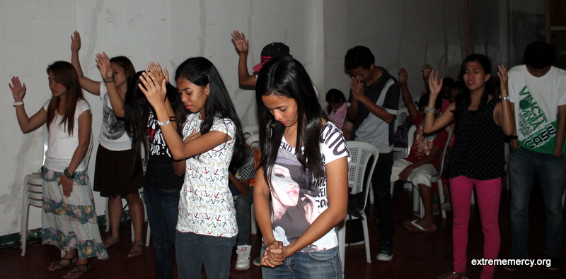Youth Worshipping God at the Refuge